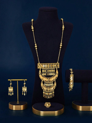 Jewelry set includes a necklace, a bracelet, a ring and a pair of earrings made of copper in gold color